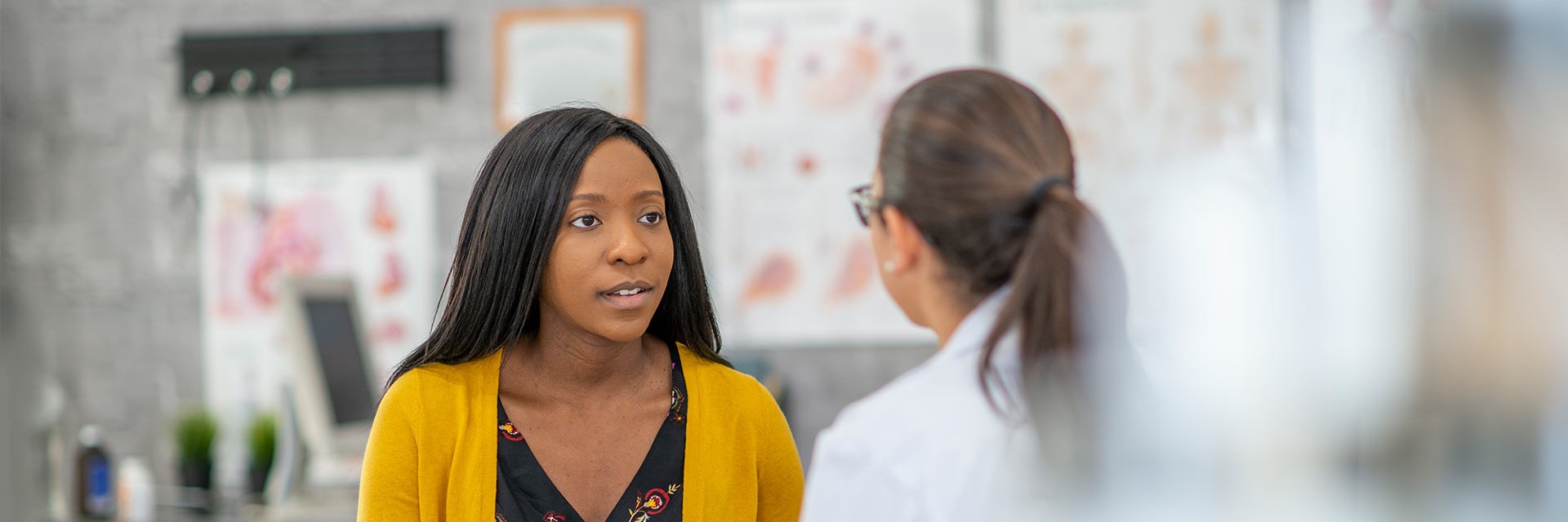Woman speaking to her doctor